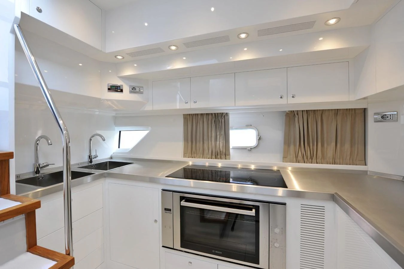 The galley features modern appliances and sleek, minimalist design. aboard SARNICO GRANDE HULL #3 Yacht for Sale