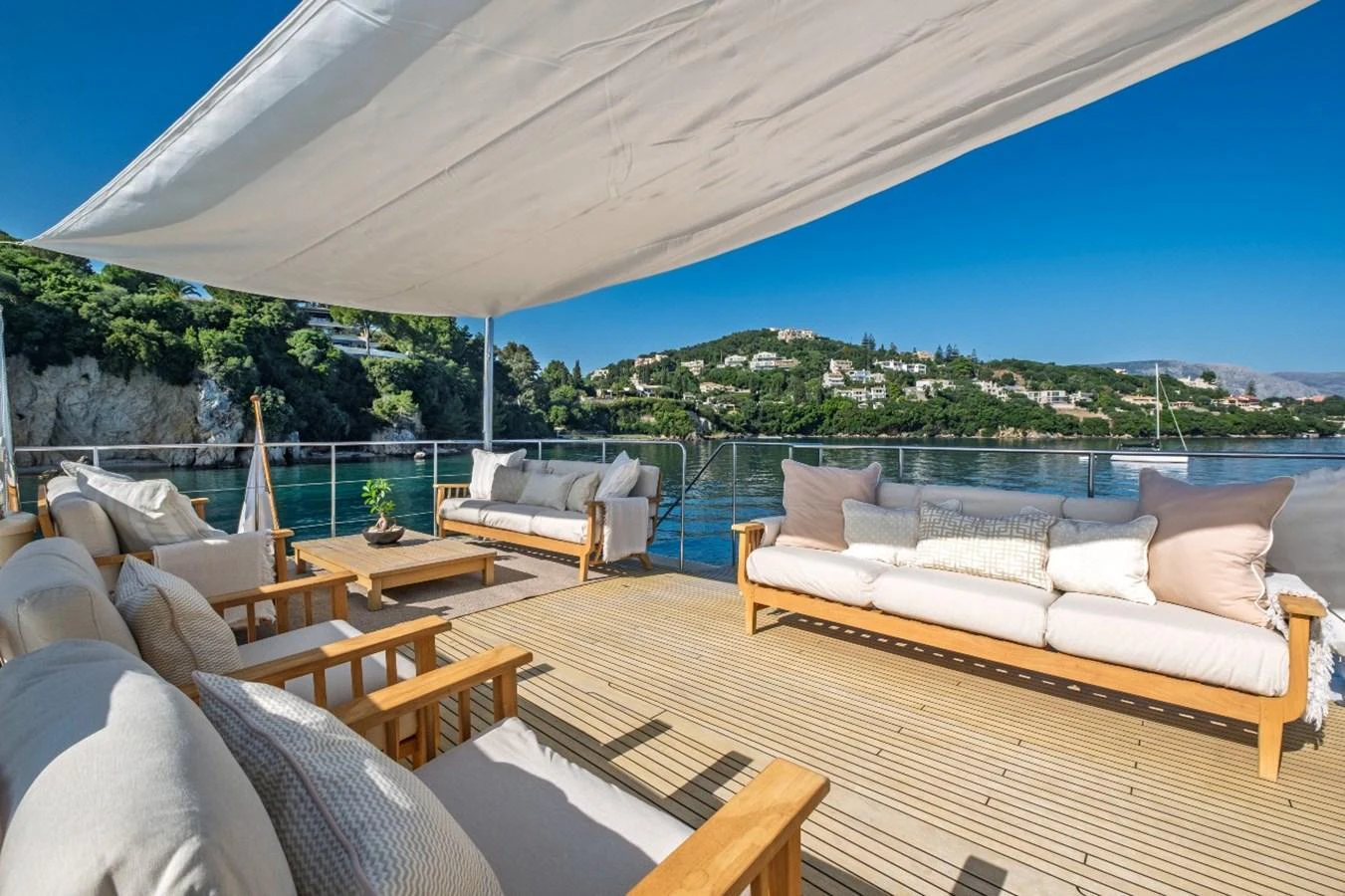 The sundeck offers a spacious and comfortable seating area with a stunning view of the surrounding landscape. aboard STALCA Yacht for Sale