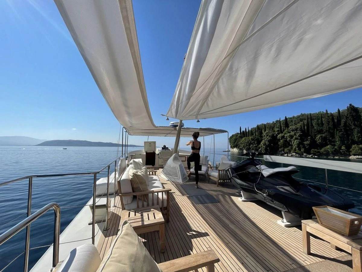 The sundeck offers a spacious and luxurious area for relaxation with ample seating and shade. aboard STALCA Yacht for Sale