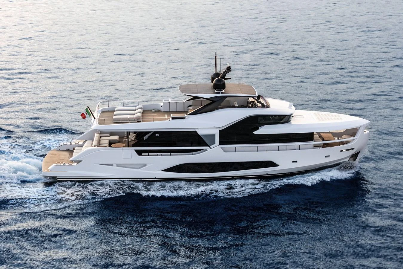 A sleek and modern yacht cruises gracefully on the open water. aboard INFYNITO 80 Yacht for Sale