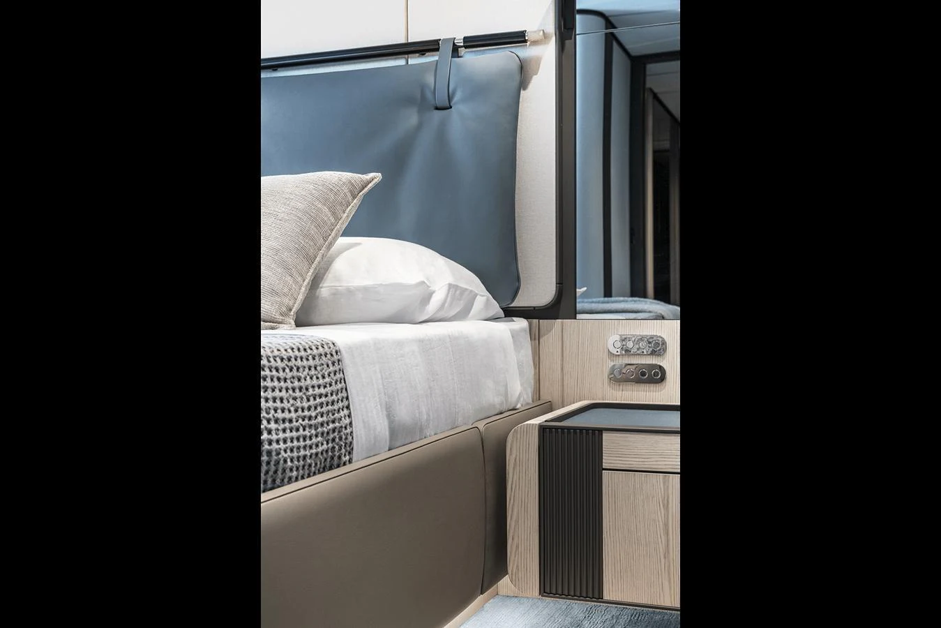 A luxurious stateroom featuring a plush bed with elegant bedding and modern furnishings. aboard INFYNITO 80 Yacht for Sale