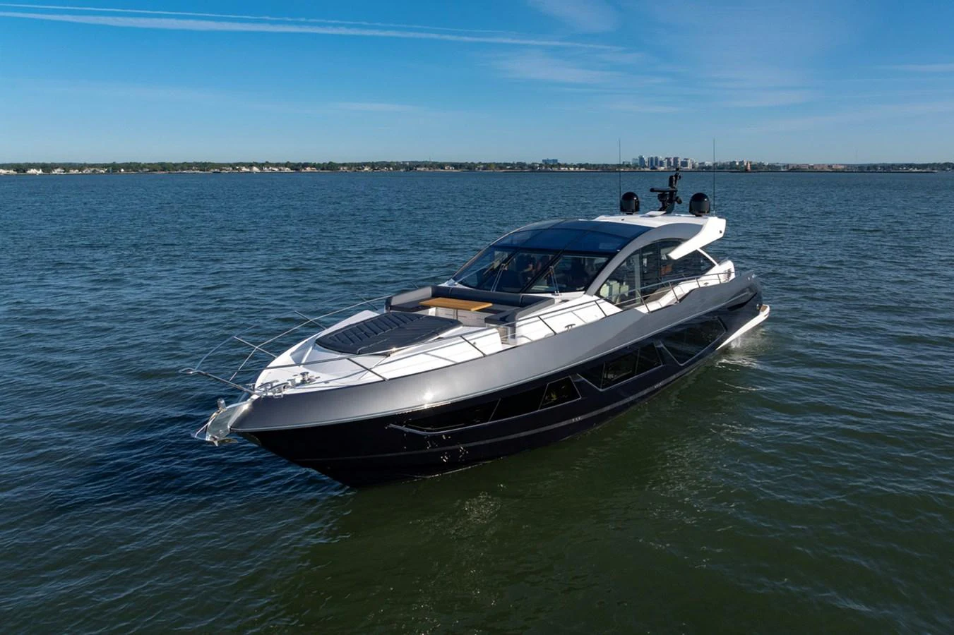 a white boat in the water aboard KB JR Yacht for Sale