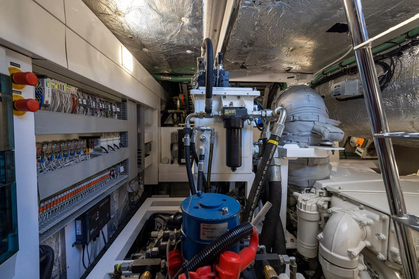 a room with machinery aboard KB JR Yacht for Sale