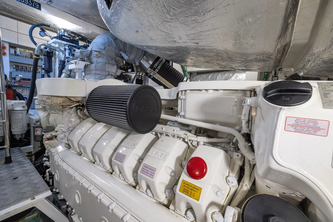 a machine with a large piece of equipment on it aboard KB JR Yacht for Sale