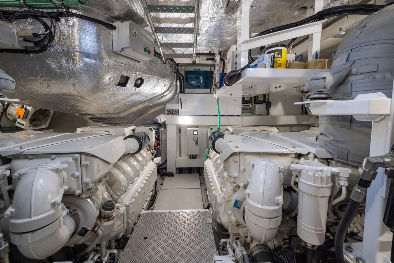 a room with several large pipes aboard KB JR Yacht for Sale