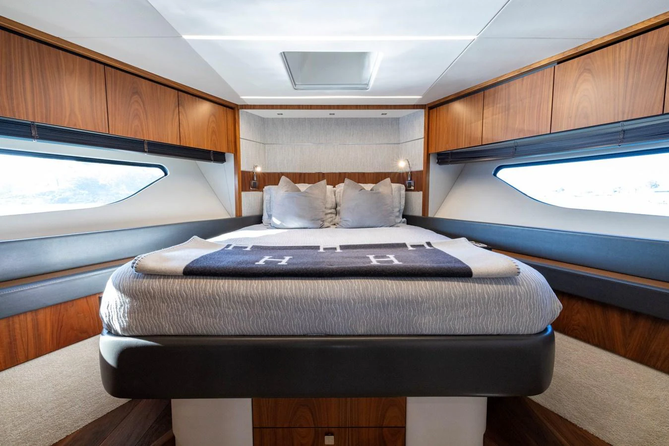 a bed in a room aboard KB JR Yacht for Sale