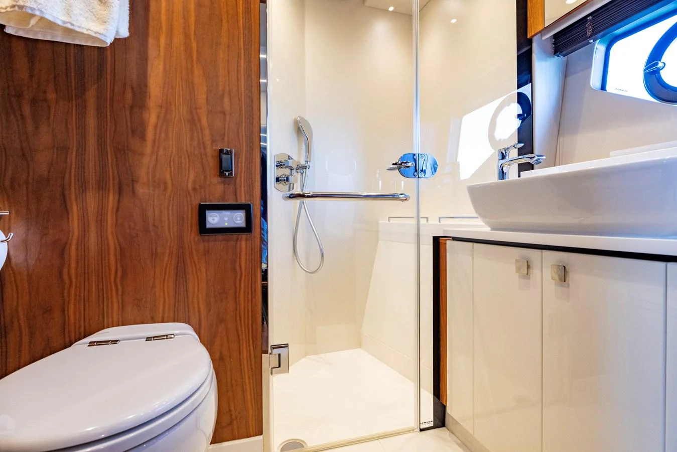 a bathroom with a toilet and sink aboard KB JR Yacht for Sale