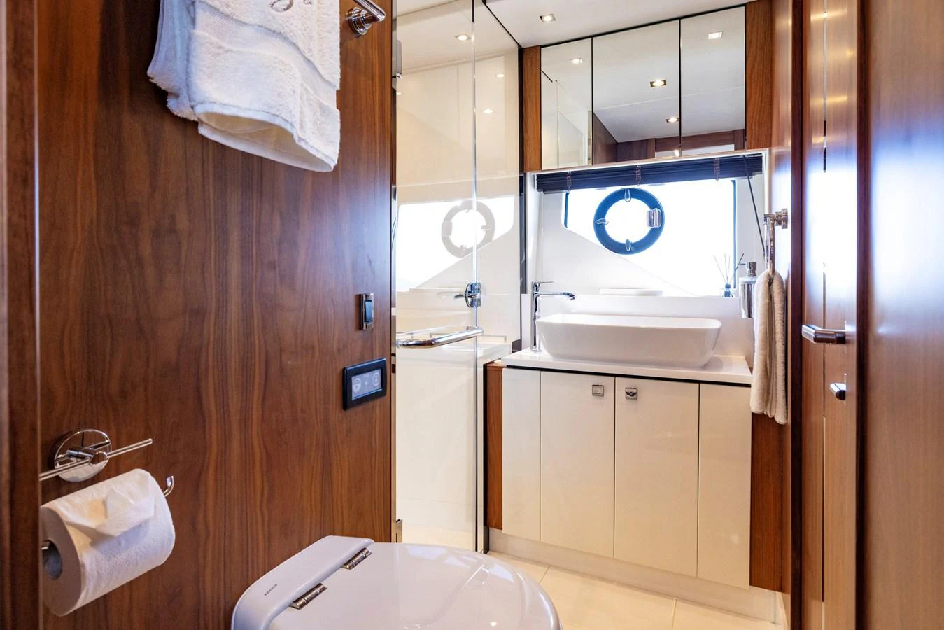 a bathroom with a sink and a mirror aboard KB JR Yacht for Sale