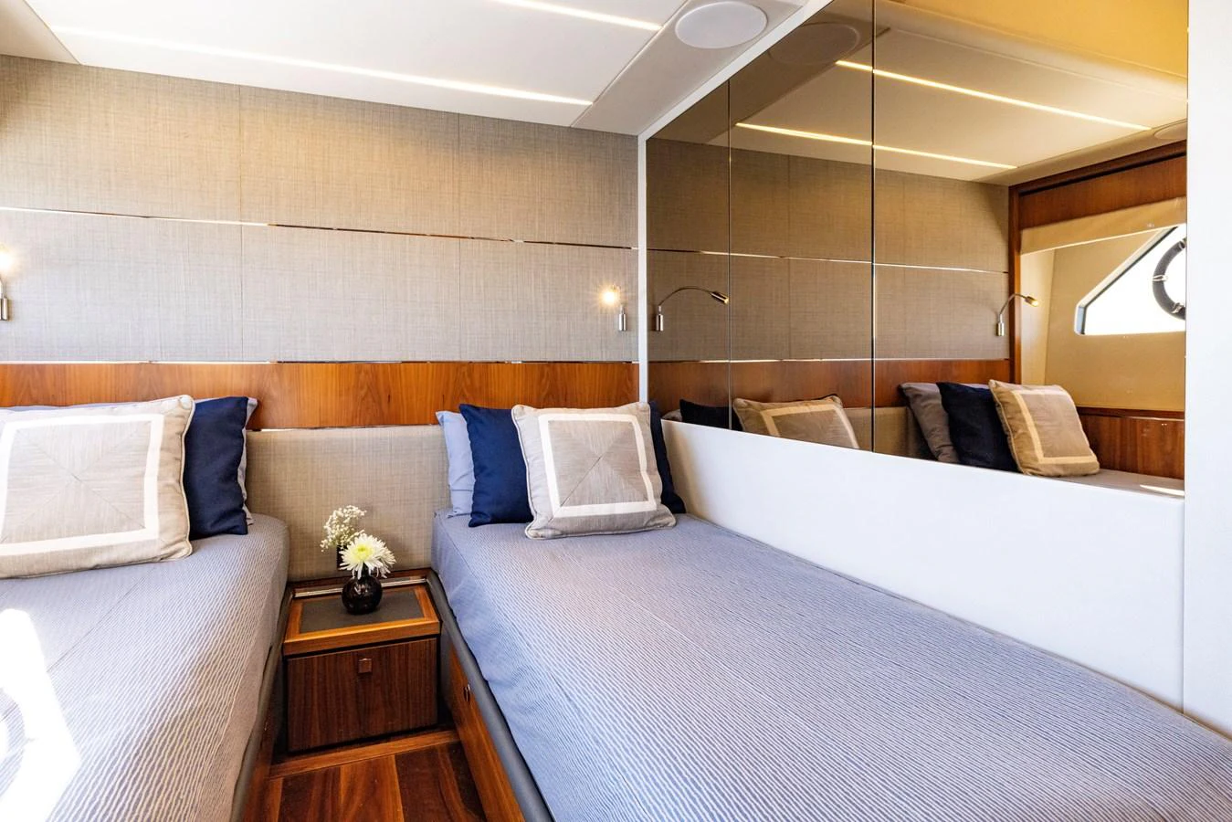 a room with a bed and a couch aboard KB JR Yacht for Sale