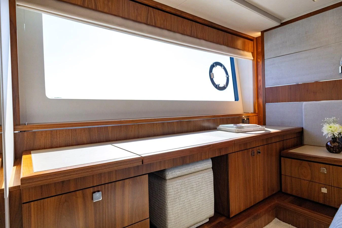 a bathroom with a large window aboard KB JR Yacht for Sale