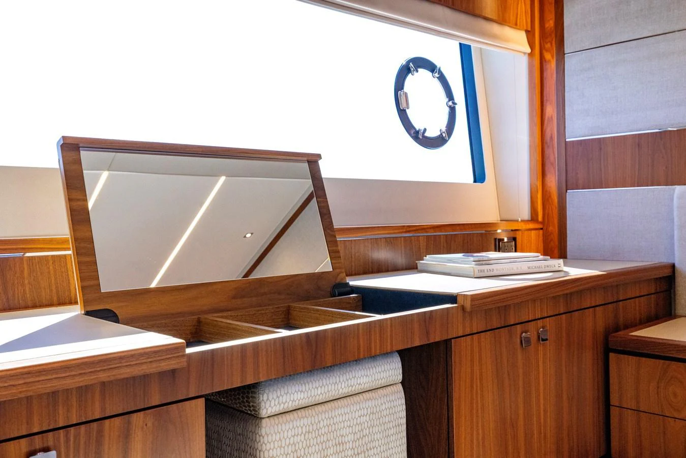 a desk with a computer on it aboard KB JR Yacht for Sale