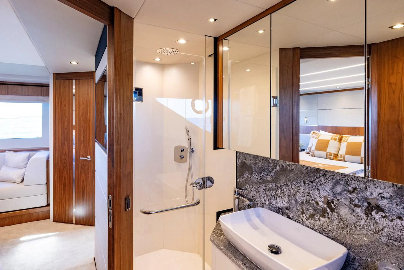 a bathroom with a large marble countertop aboard KB JR Yacht for Sale