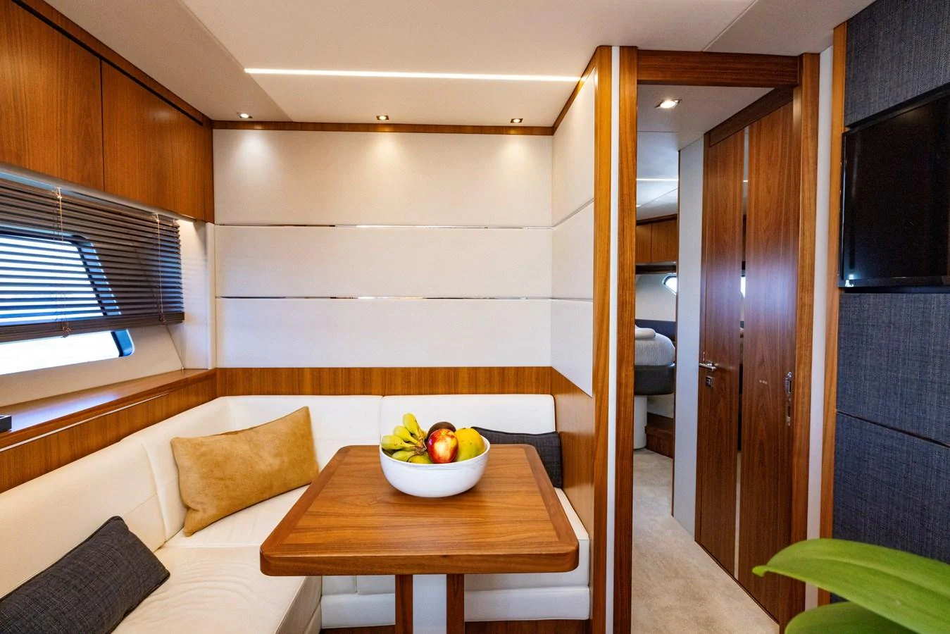 a bowl of fruit on a table aboard KB JR Yacht for Sale