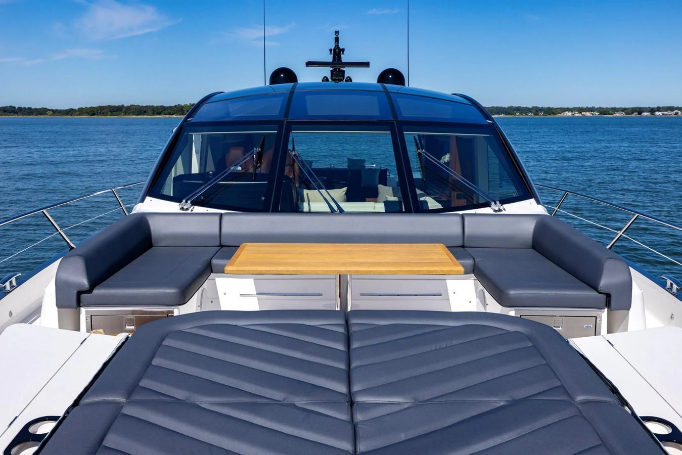 a person driving a boat aboard KB JR Yacht for Sale