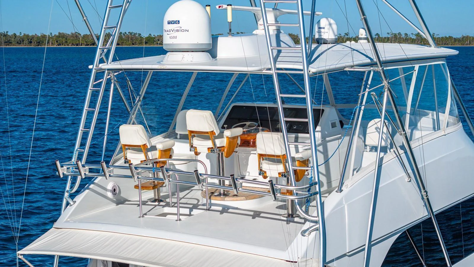 The yacht features a spacious flybridge with comfortable seating and a commanding view of the surroundings. aboard FIRST BITE Yacht for Sale