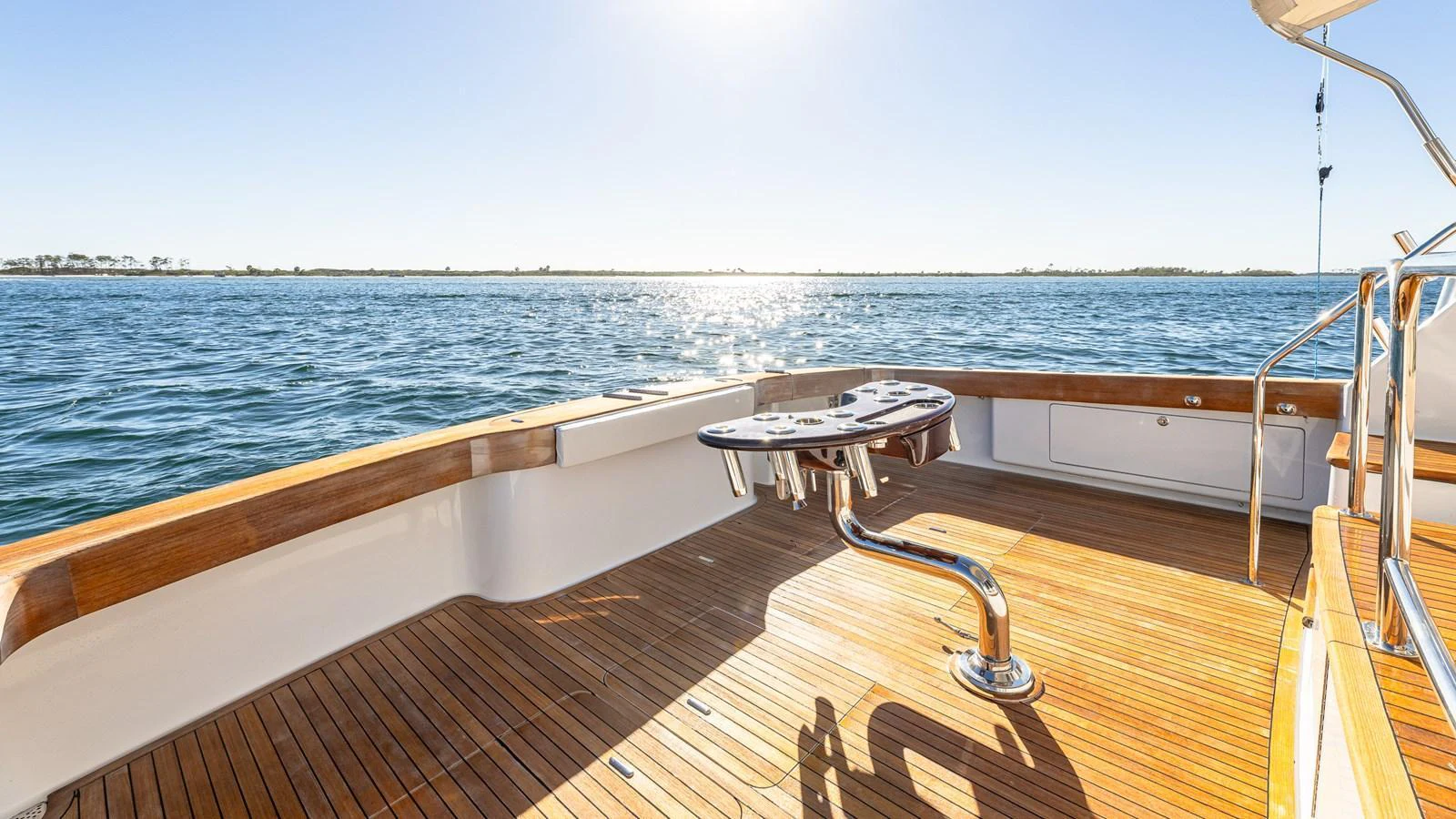 The aft deck offers a spacious and inviting area with a beautiful view of the water. aboard FIRST BITE Yacht for Sale