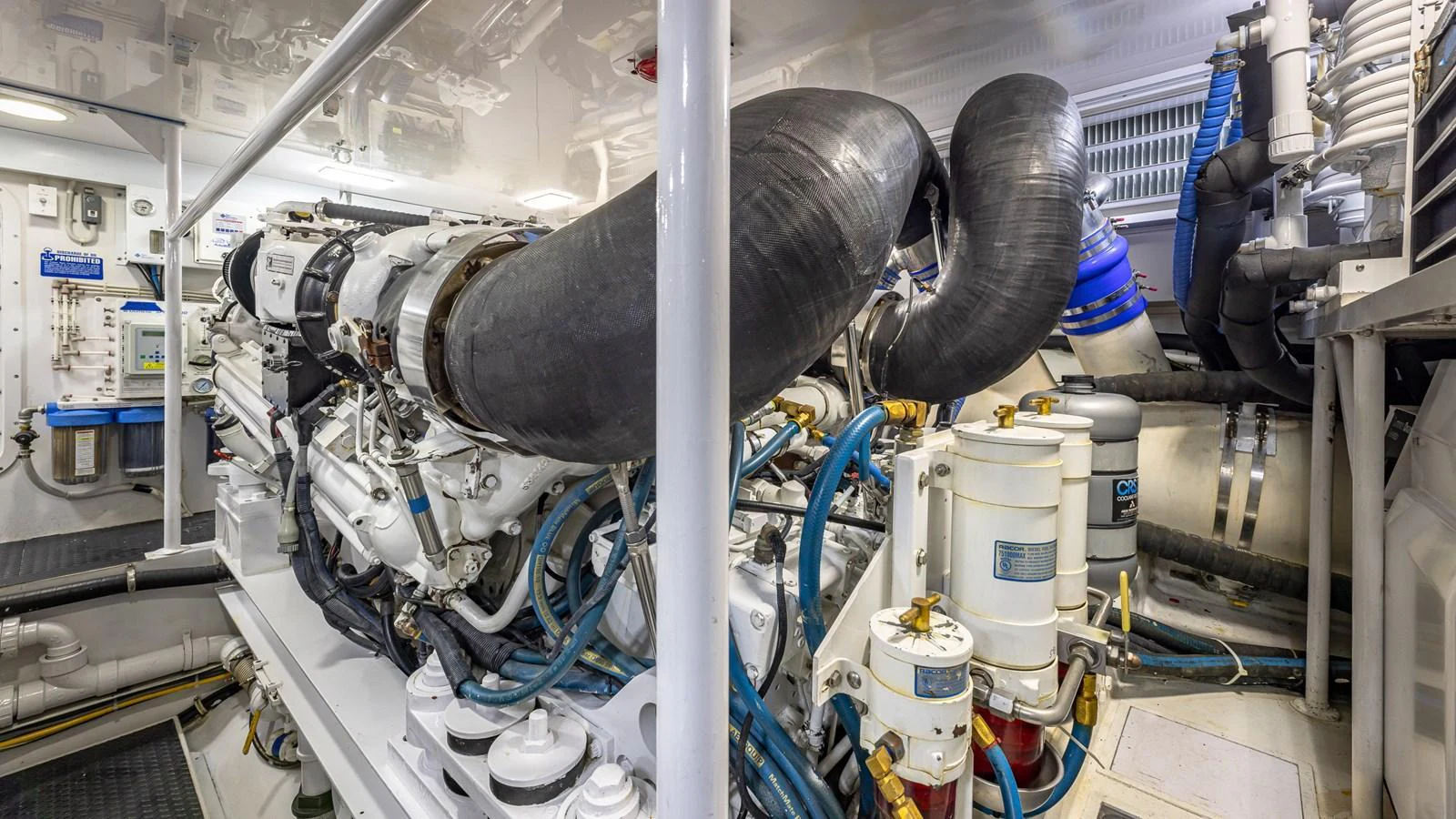 The image showcases the yacht's well-maintained engine room with advanced machinery and equipment. aboard FIRST BITE Yacht for Sale
