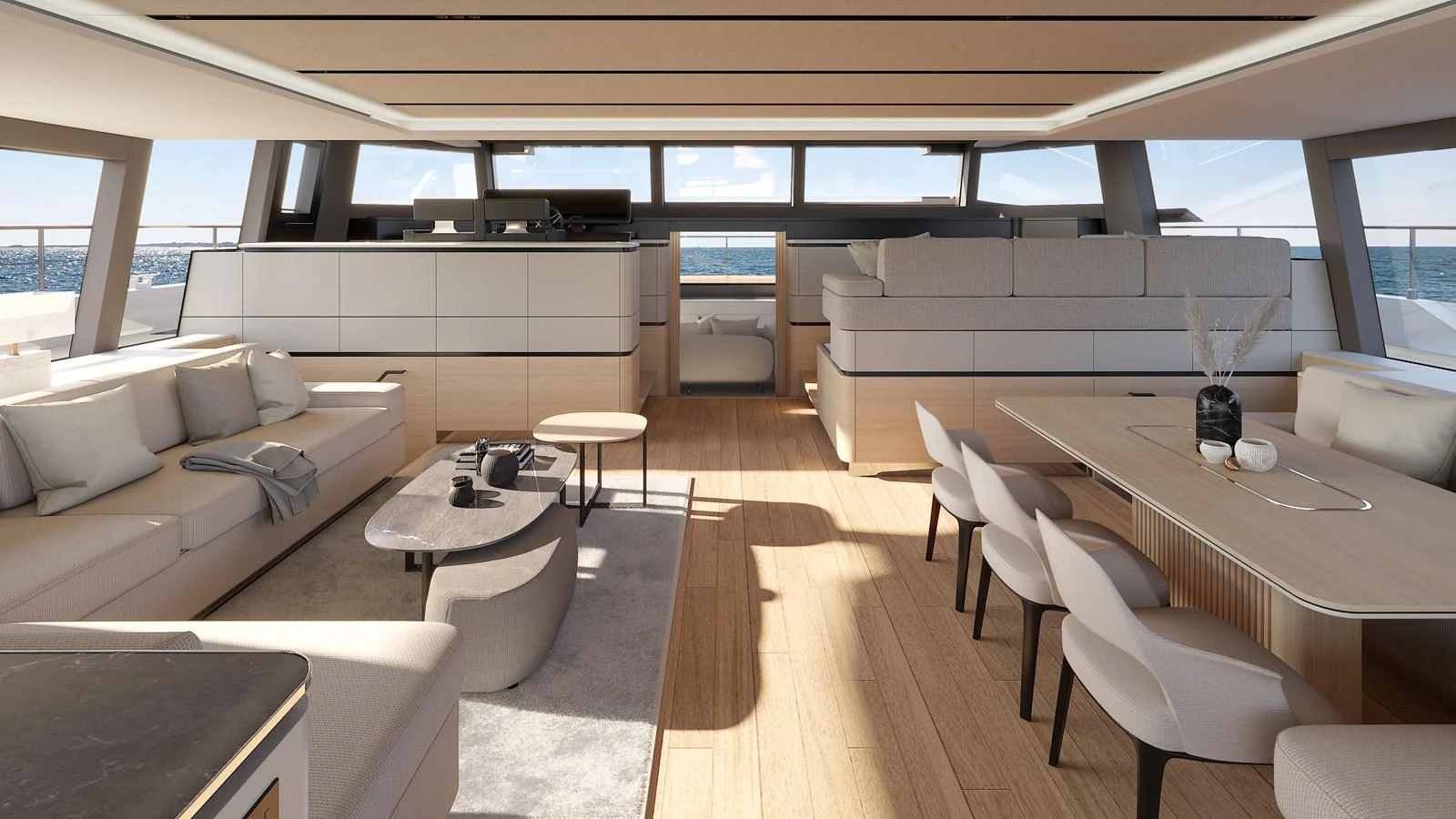 The spacious salon features modern furnishings and ample natural light. aboard CELESTIA 72 Yacht for Sale