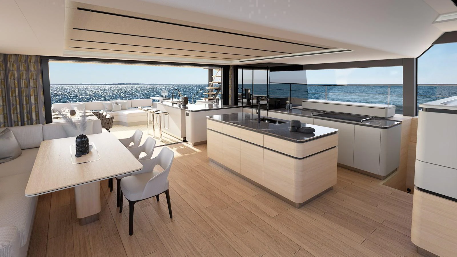 The spacious galley and dining area offer a luxurious and open environment with stunning ocean views. aboard CELESTIA 72 Yacht for Sale