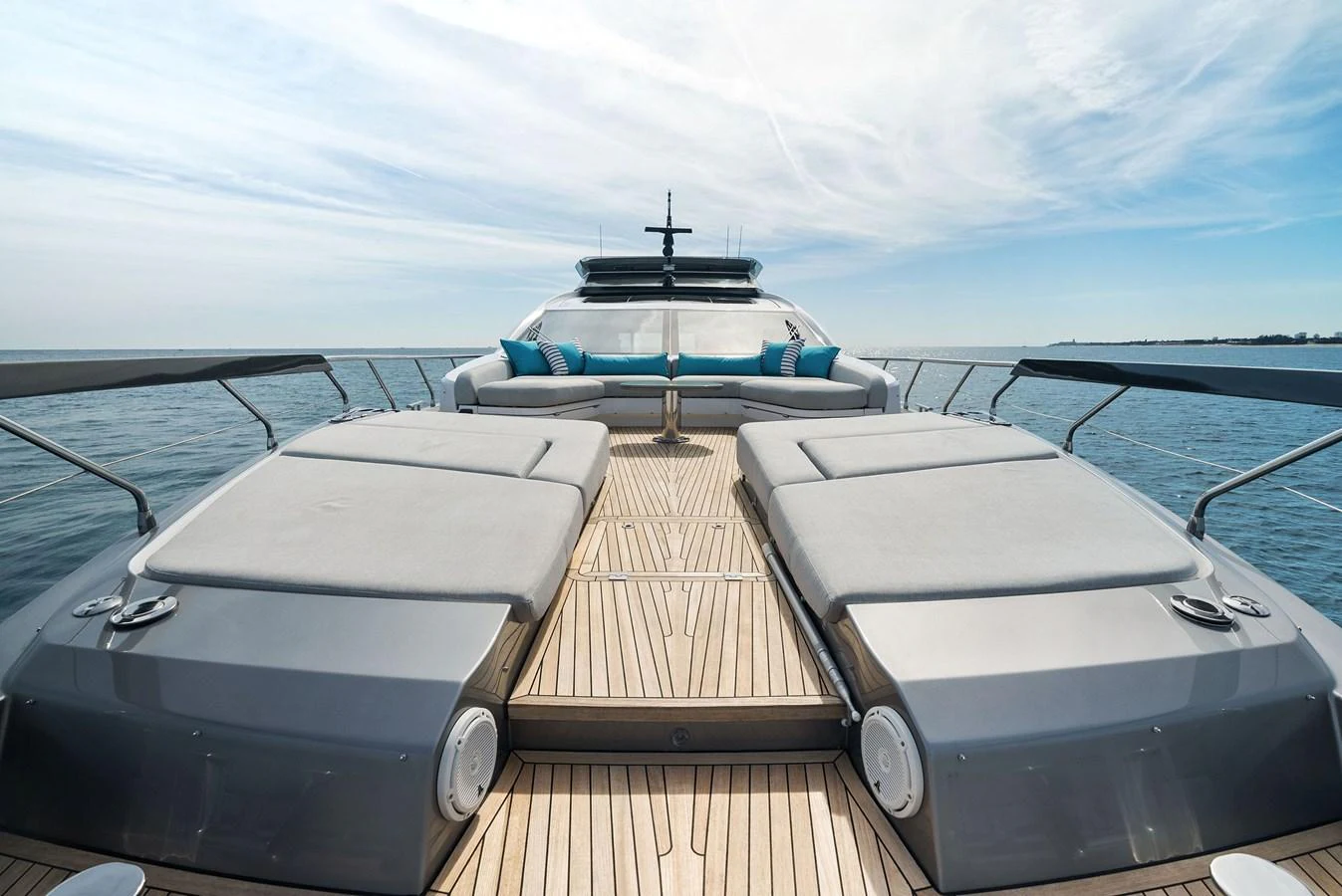 The foredeck features spacious sun pads and a comfortable seating area, perfect for relaxation. aboard OCEAN'S SE7EN Yacht for Sale