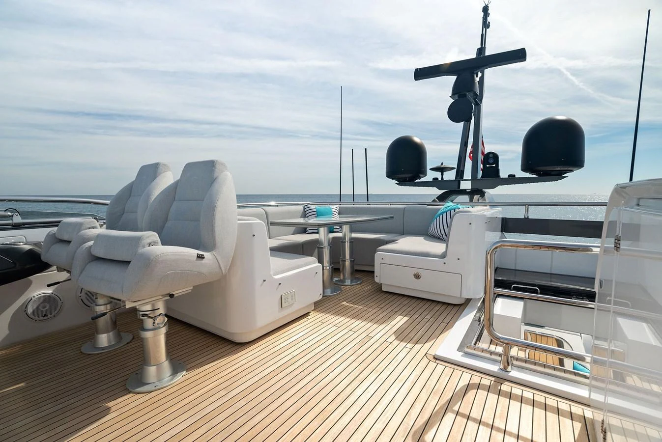 The flybridge offers a spacious and luxurious area for relaxation and navigation. aboard OCEAN'S SE7EN Yacht for Sale