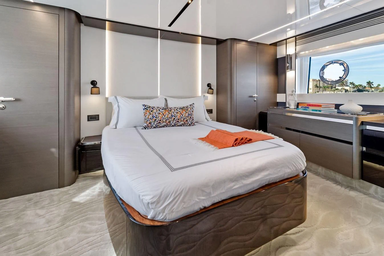 A luxurious stateroom featuring a comfortable bed and modern decor. aboard OCEAN'S SE7EN Yacht for Sale
