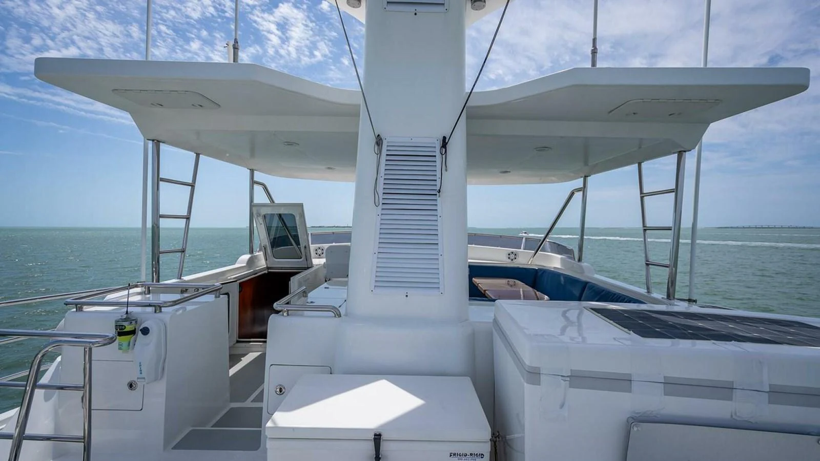 The flybridge offers a spacious and open area with ample seating and stunning views of the sea. aboard TAKE 5 Yacht for Sale