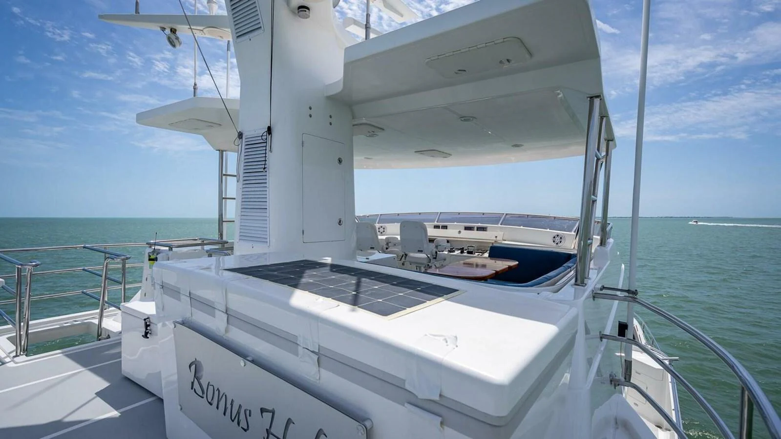 The flybridge offers a spacious area with a commanding view of the sea. aboard TAKE 5 Yacht for Sale