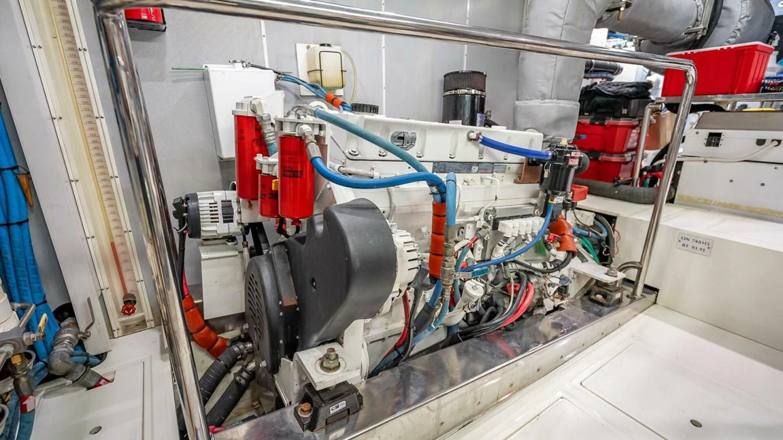 The image showcases the well-maintained engine room of the yacht, highlighting its mechanical components. aboard TAKE 5 Yacht for Sale