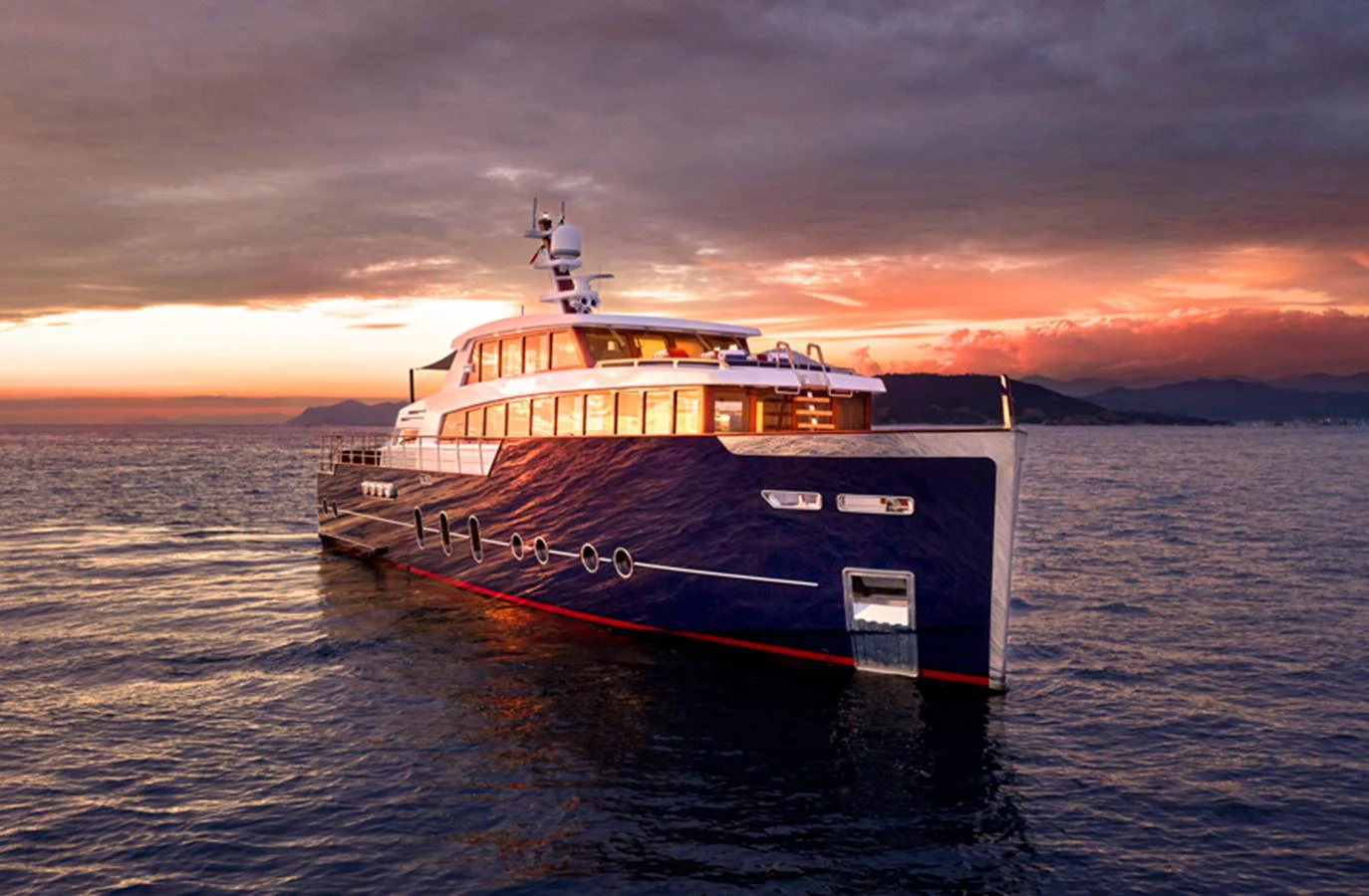 A stunning yacht cruises gracefully on calm waters against a dramatic sunset backdrop. aboard PICCHIOTTI GENTLEMAN 24 Yacht for Sale