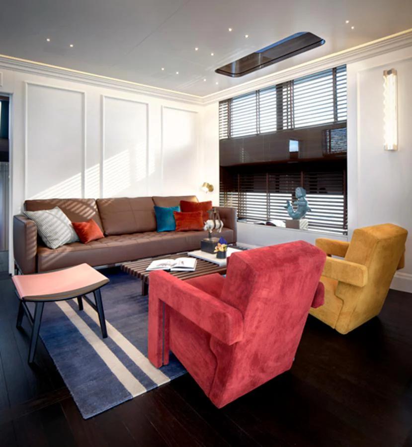 The salon features a stylish and comfortable seating area with modern decor and ample natural light. aboard PICCHIOTTI GENTLEMAN 24 Yacht for Sale