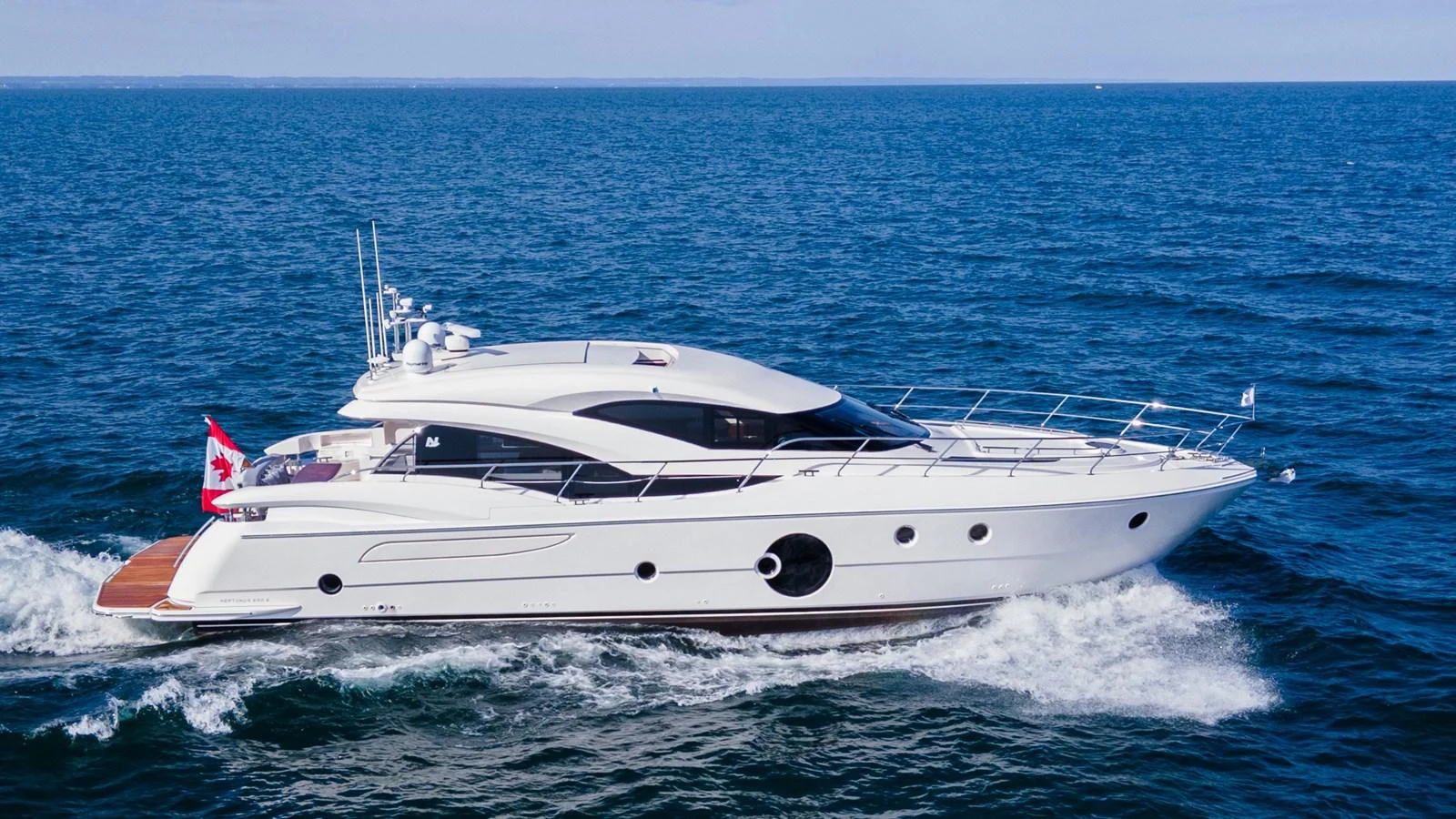 A sleek and modern yacht cruises gracefully on open waters. aboard NEPTUNUS 650E Yacht for Sale