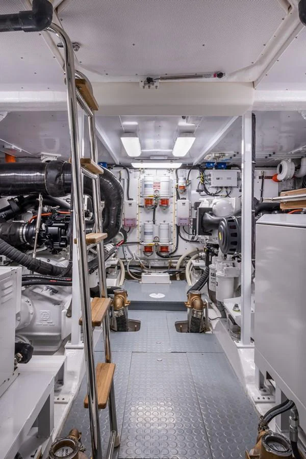 The image showcases the well-organized and clean engine room of the yacht, highlighting its technical sophistication. aboard NEPTUNUS 650E Yacht for Sale