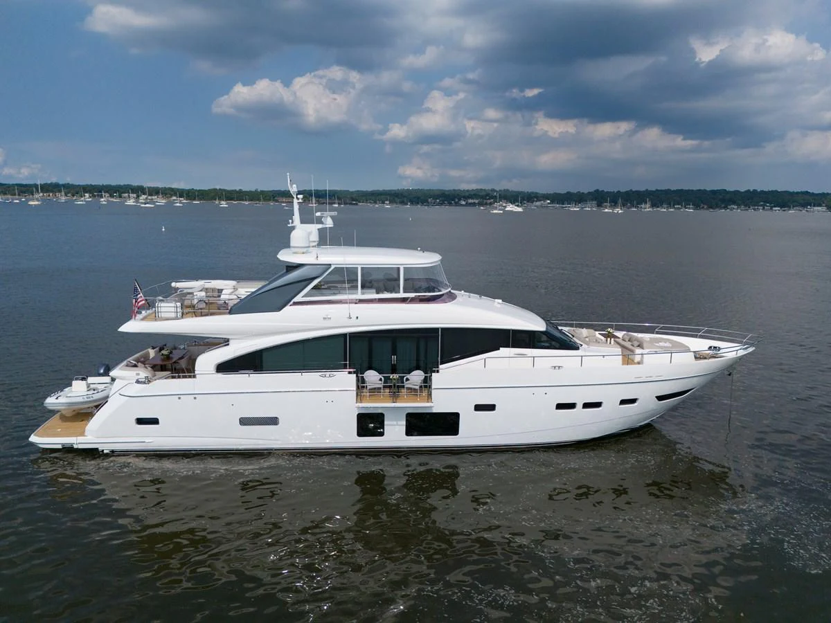 a white yacht in the water aboard JUST PERFECT Yacht for Sale
