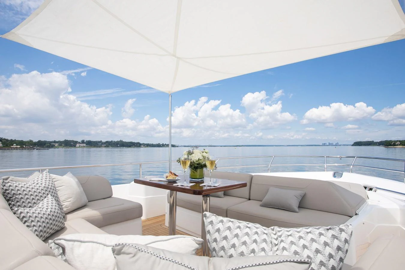 a room with a table and chairs aboard JUST PERFECT Yacht for Sale