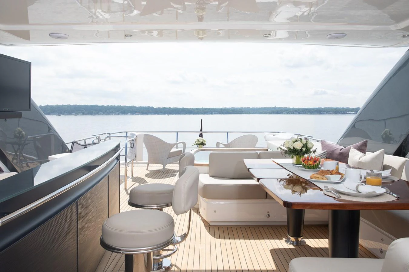 a room with a table and chairs aboard JUST PERFECT Yacht for Sale