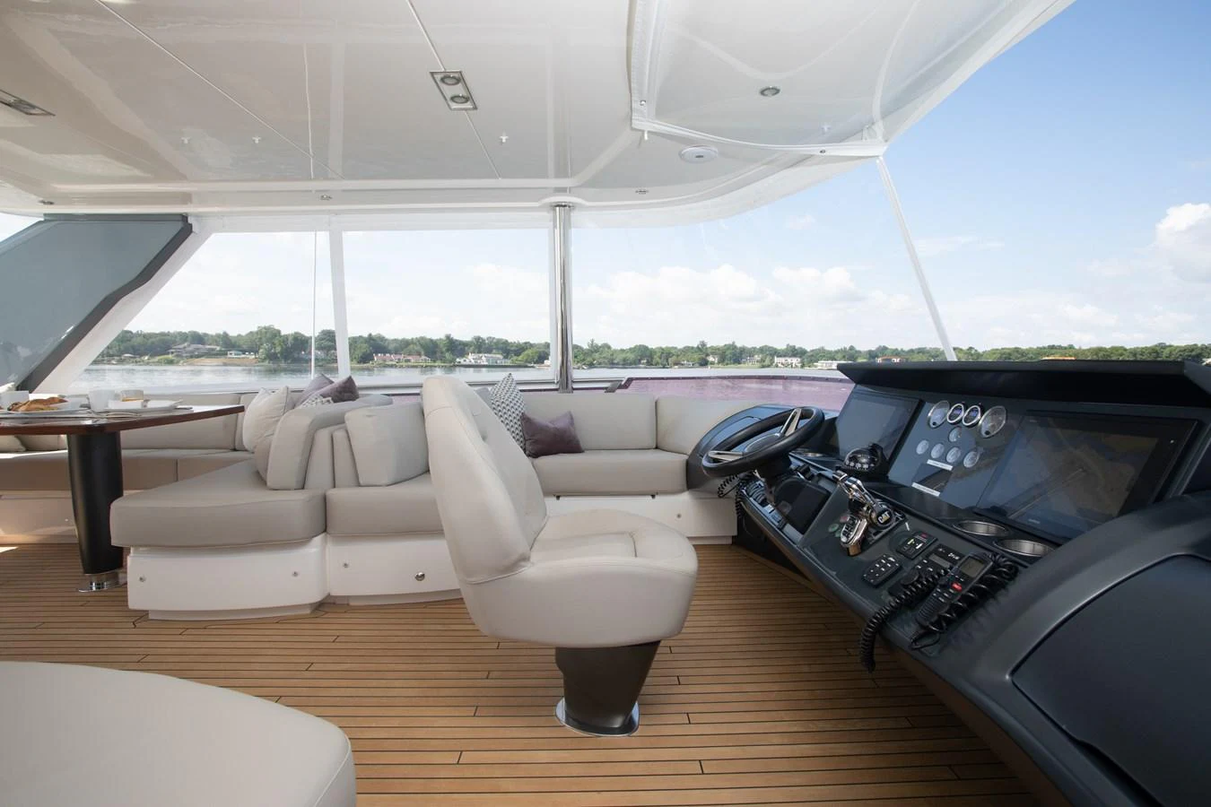 a living room with a couch and a table aboard JUST PERFECT Yacht for Sale
