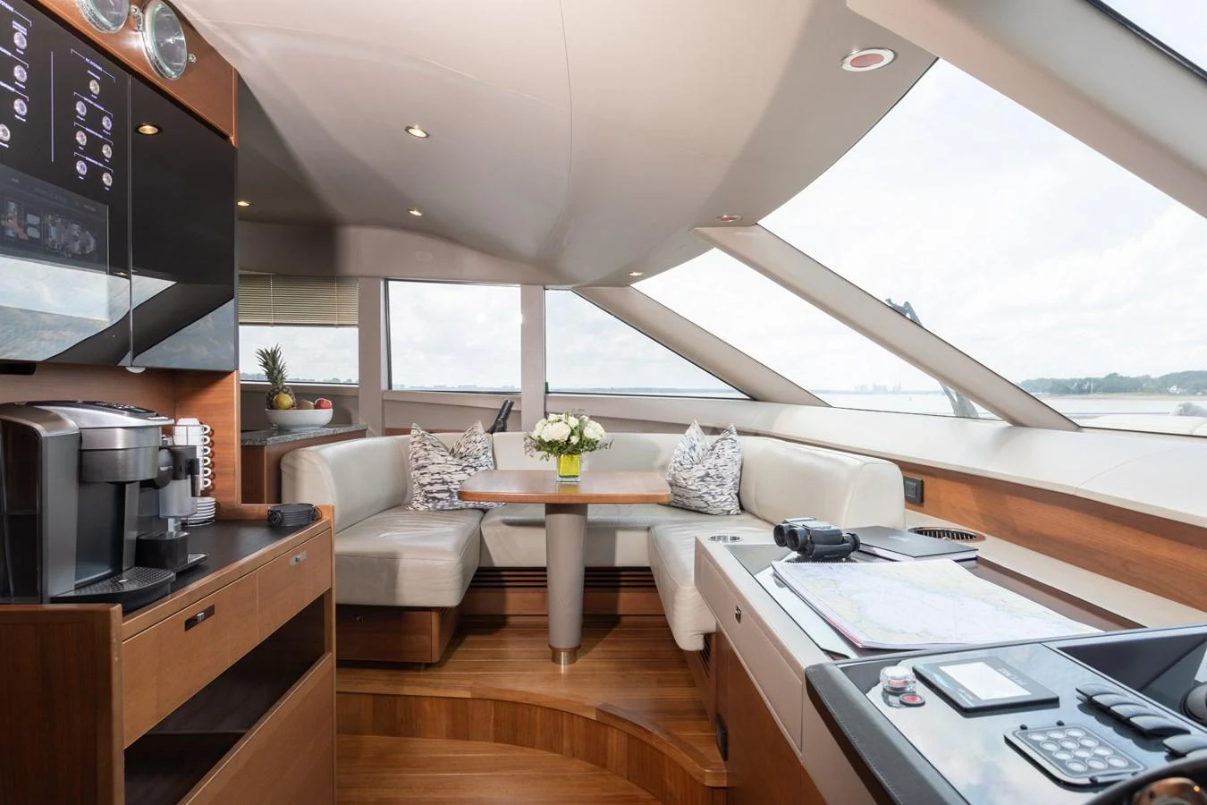 a living room with a couch and a table aboard JUST PERFECT Yacht for Sale