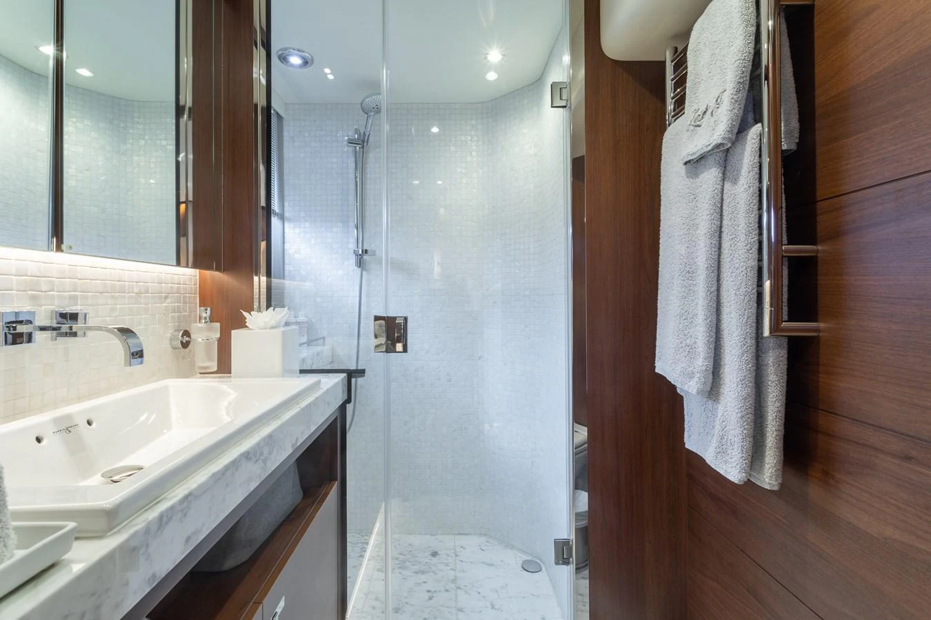 a bathroom with a shower and sink aboard JUST PERFECT Yacht for Sale