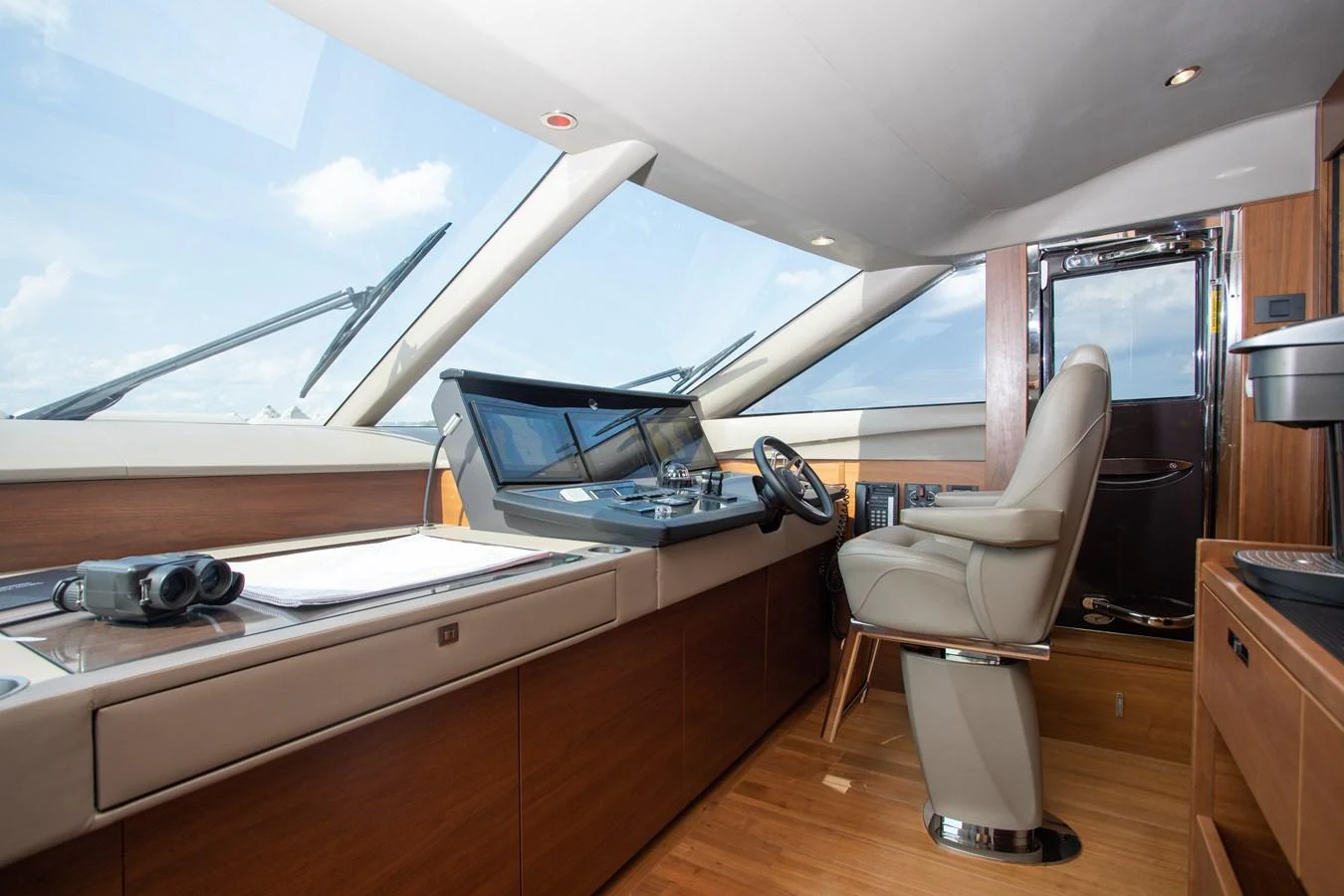 a car with a desk and a chair aboard JUST PERFECT Yacht for Sale