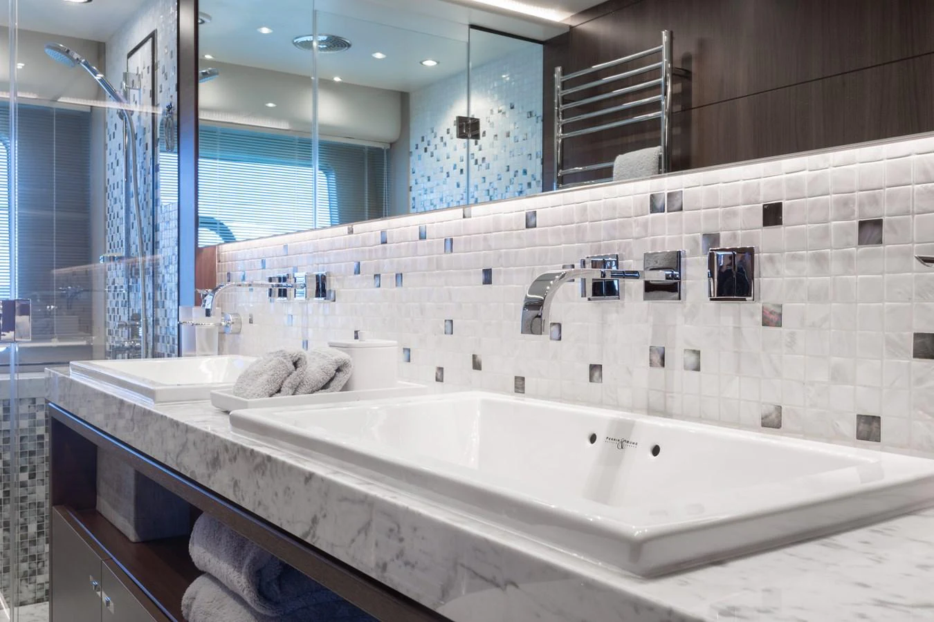 a bathroom with a large mirror aboard JUST PERFECT Yacht for Sale