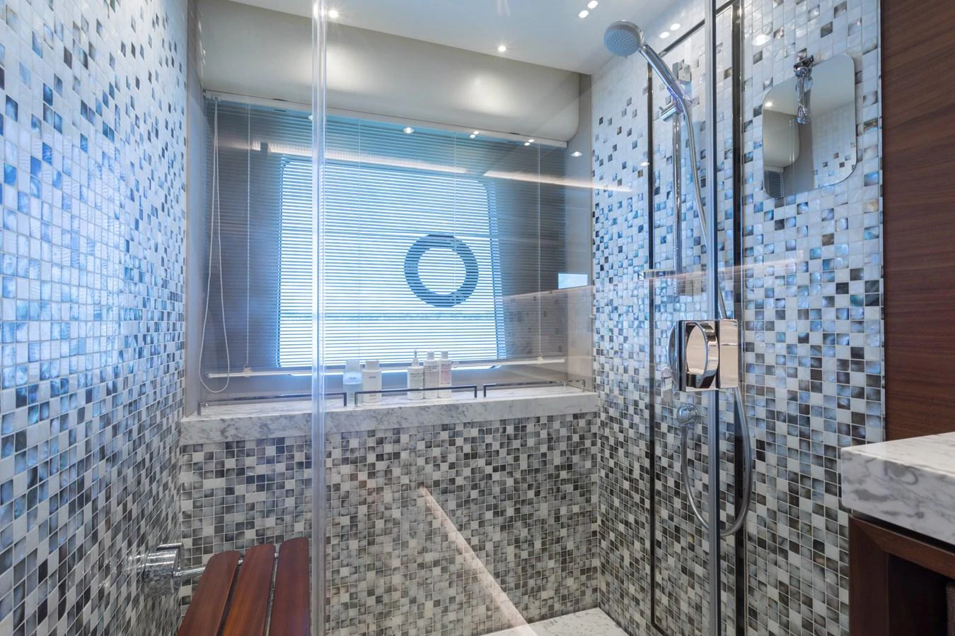 a bathroom with a glass shower aboard JUST PERFECT Yacht for Sale