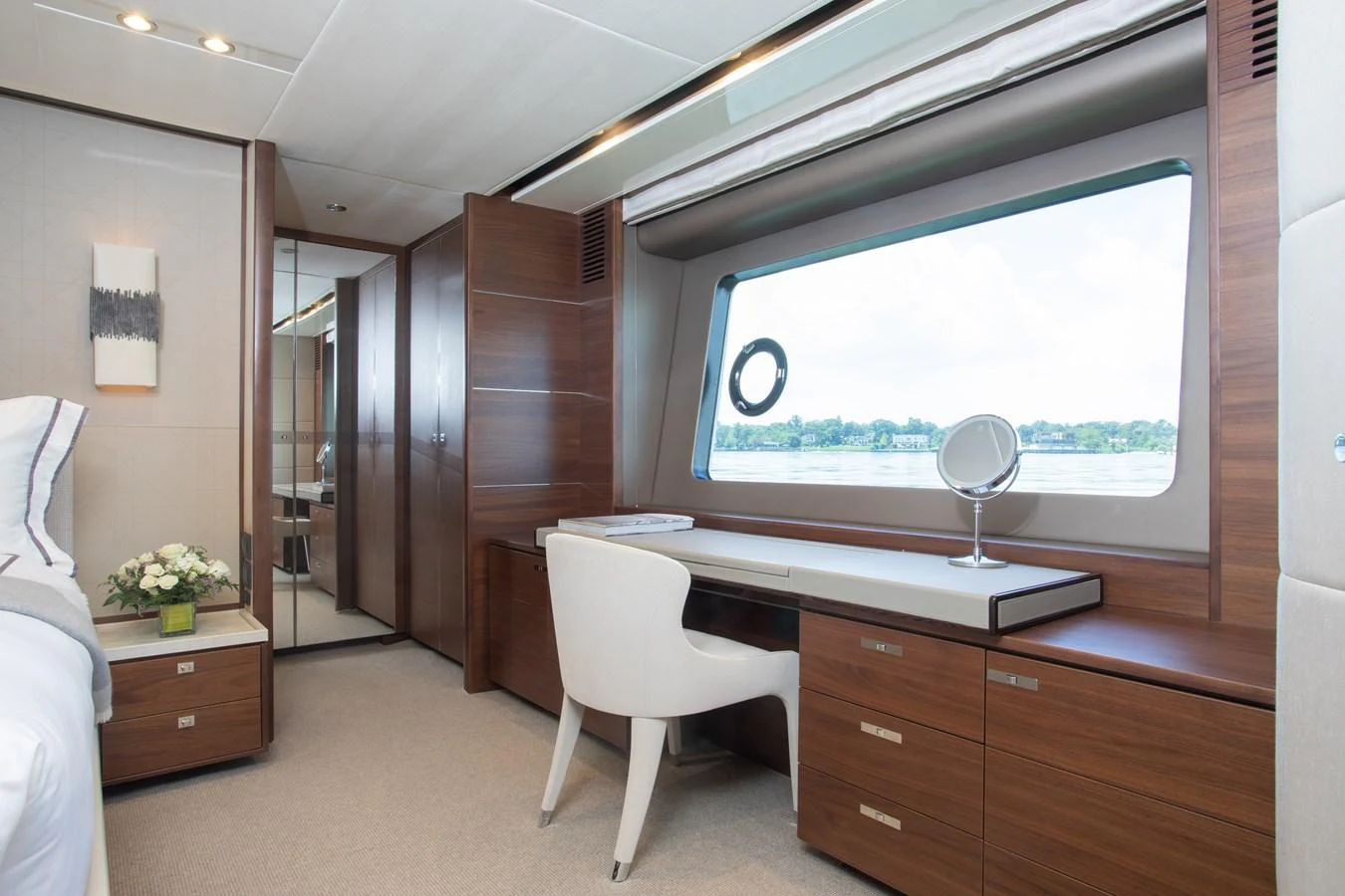 a room with a desk and a large window aboard JUST PERFECT Yacht for Sale
