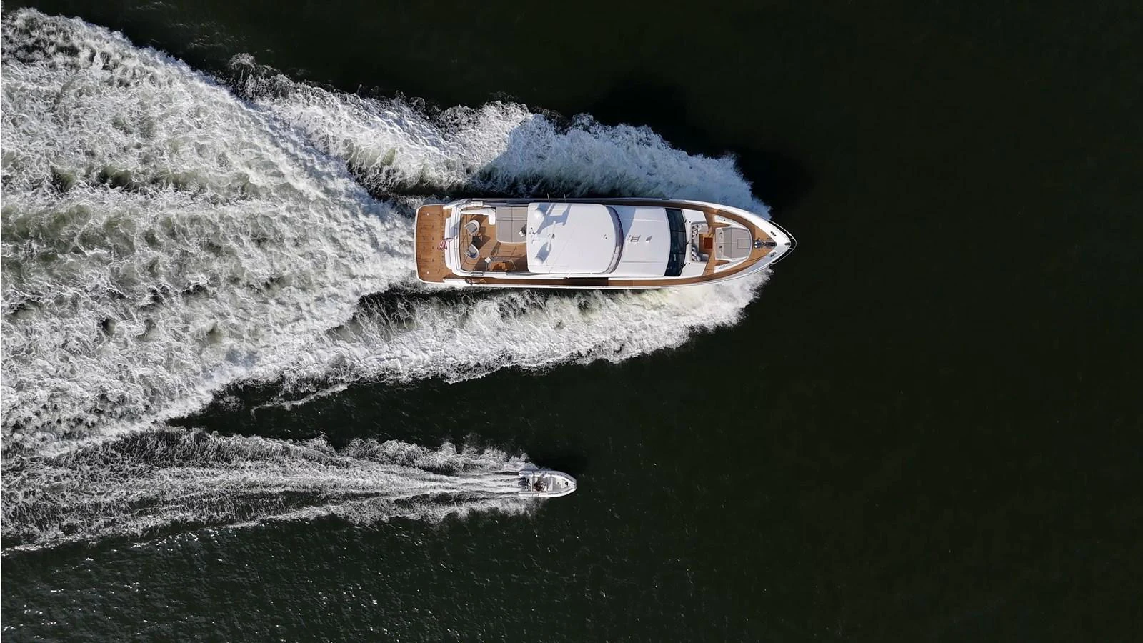 a bottle of beer on a rocky surface aboard JUST PERFECT Yacht for Sale