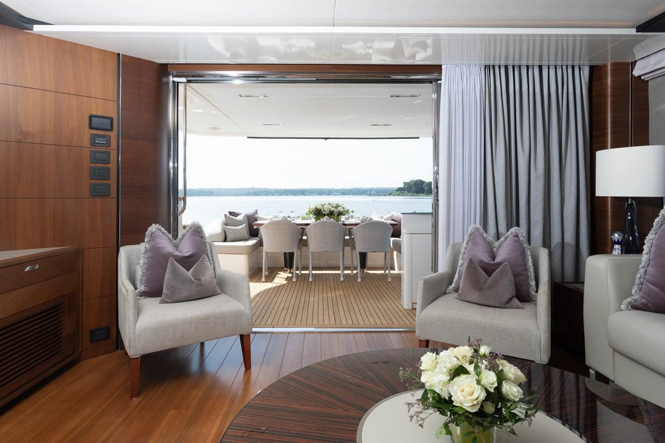 a living room with a large window aboard JUST PERFECT Yacht for Sale