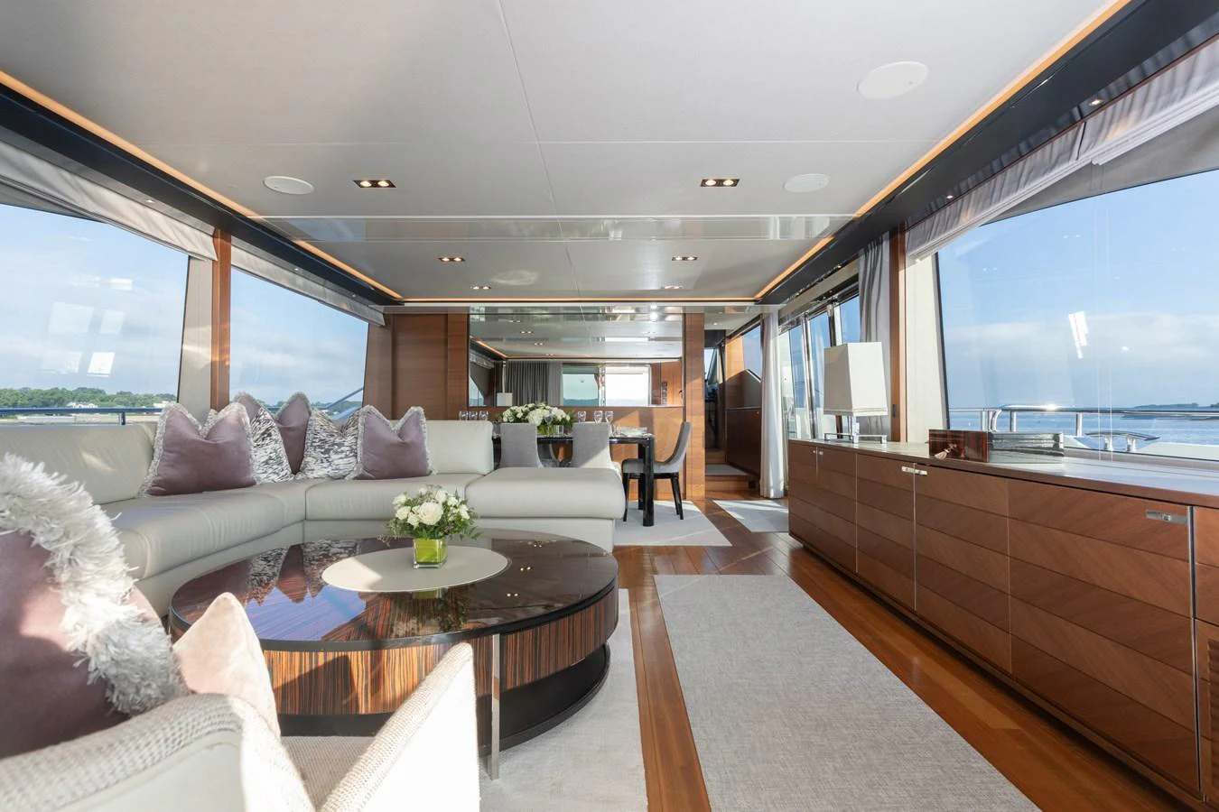 a living room with a large window aboard JUST PERFECT Yacht for Sale