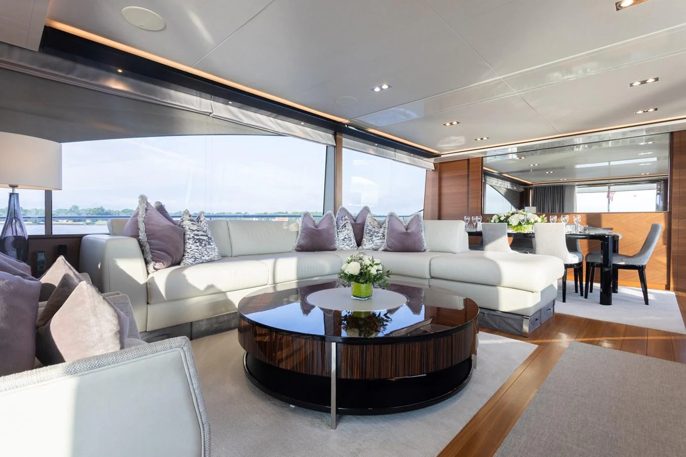 a living room with a large window aboard JUST PERFECT Yacht for Sale