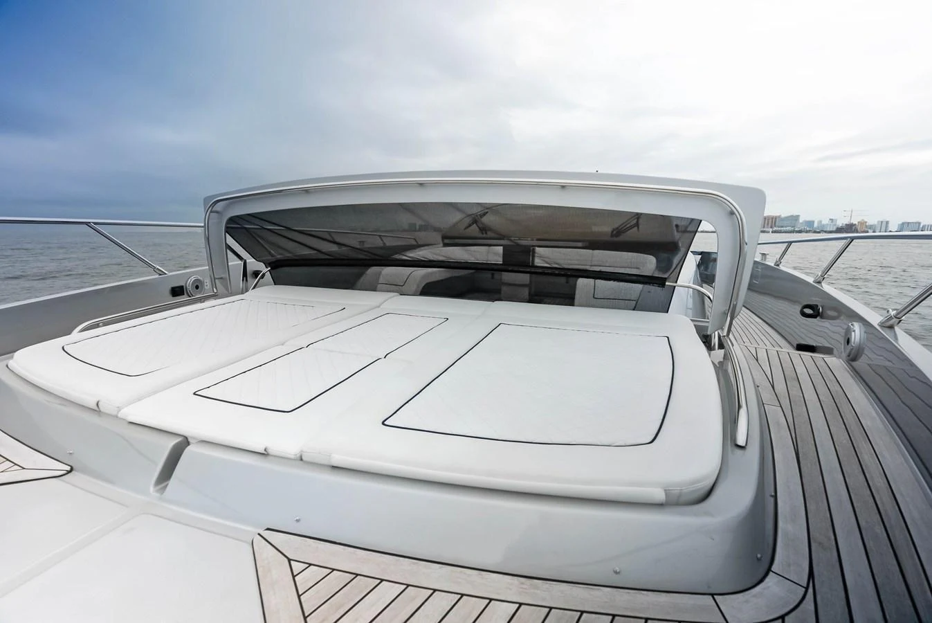 The yacht's foredeck features spacious sun pads for ultimate relaxation. aboard FERRETTI  TRADE Yacht for Sale