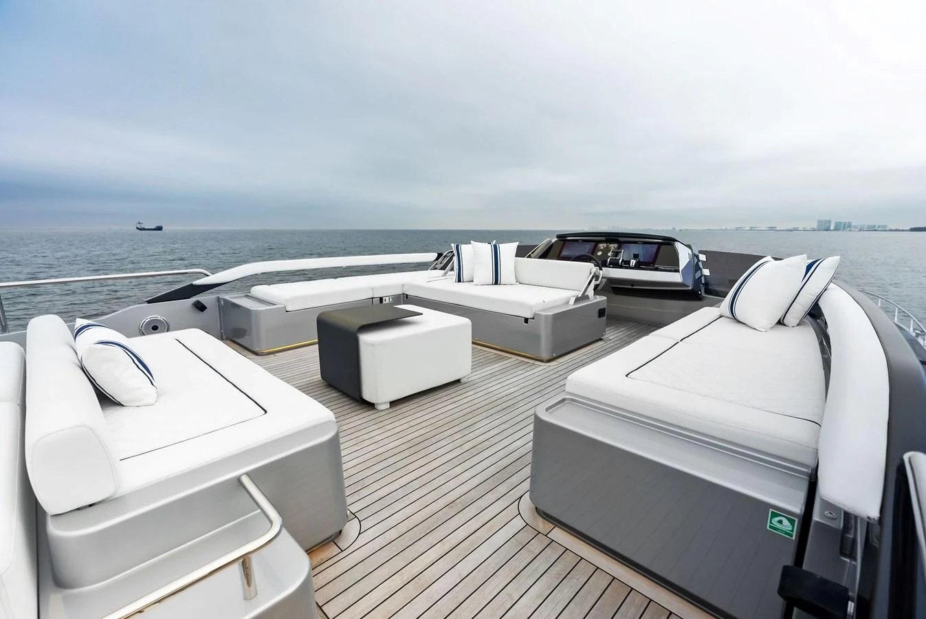 The flybridge offers a spacious and luxurious lounging area with ample seating and stunning ocean views. aboard FERRETTI  TRADE Yacht for Sale
