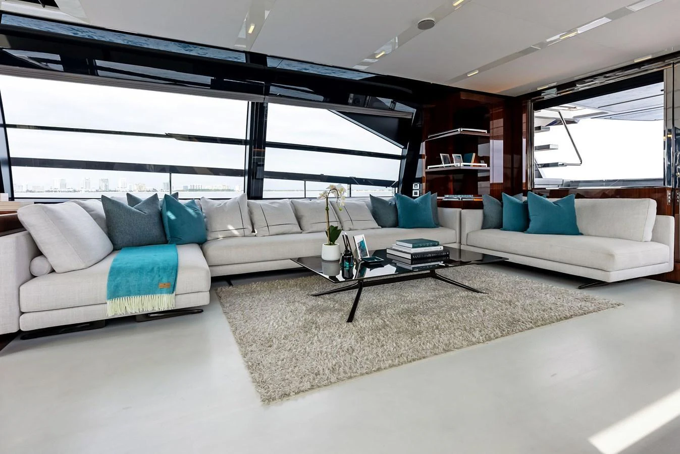 The salon features modern furnishings with ample natural light and panoramic views. aboard FERRETTI  TRADE Yacht for Sale